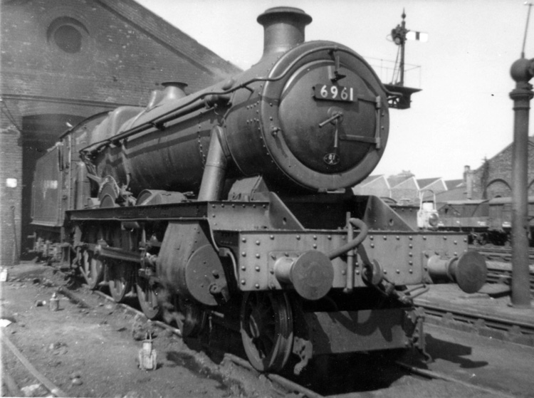 6961
